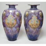 A pair of Doulton stoneware vases by Florie Jones, 31cm
