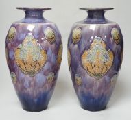 A pair of Doulton stoneware vases by Florie Jones, 31cm