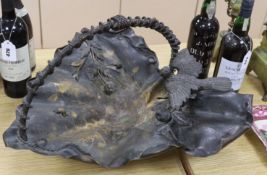 A Japanese bronze leaf centrepiece dish with a bird and flower surmount and handle, 53cm deep,