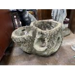 A reconstituted stone faux trunk section garden planter, height 30cm