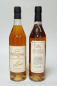 A bottle of Armagnac Ducastaing and another bottle of Armagnac