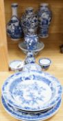 A quantity of blue and white Chinese porcelain dishes and vessels, 18th century and later, tallest