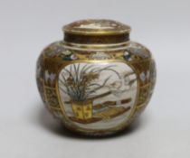 A Japanese Satsuma lidded jar and cover, 12cm high