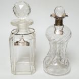A silver mounted glass decanter with silver ‘BRANDY’ label and another
