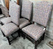 A set of four 17th century style Spanish walnut dining chairs, with upholstered backs and seats