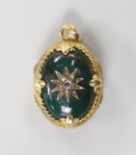A 1940's? yellow metal and bloodstone set egg shaped mourning pendant, with rose cut diamond set