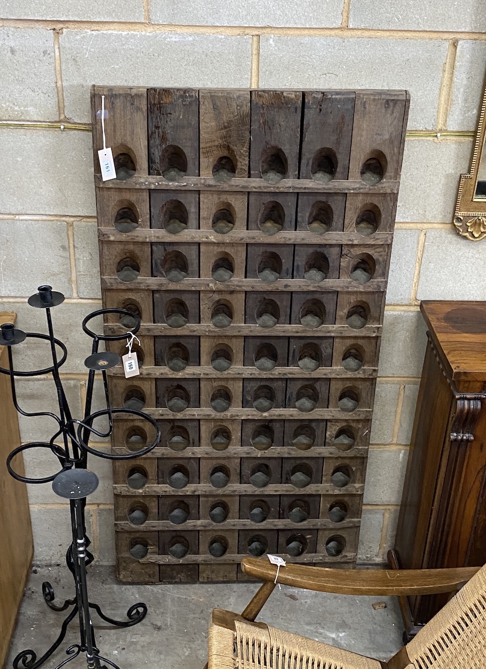 A 19th century French oak riddling rack for Champagne/wine bottles, width 73cm, height 150cm