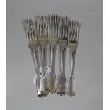 Five assorted George IV/William IV silver fiddle pattern table forks, including four London, 1827,