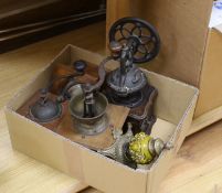Four wooden and metal coffee mills,