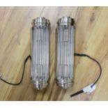 A pair of Art Deco style chrome light fittings