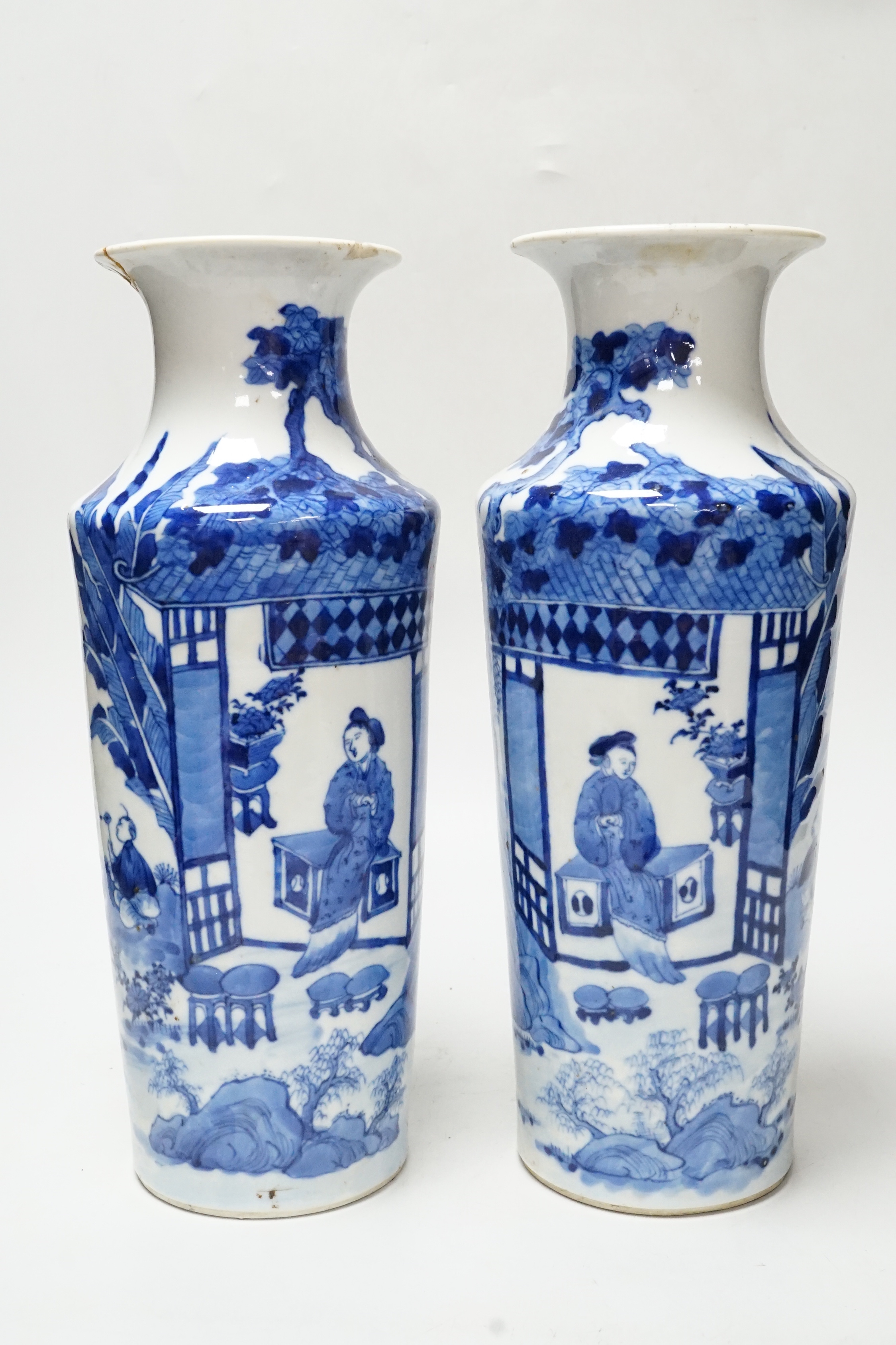 A pair of late 19th century Chinese blue and white vases, 31cm