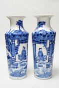 A pair of late 19th century Chinese blue and white vases, 31cm