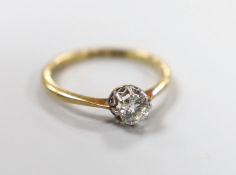 An 18ct & plat set solitaire diamond ring, size P/Q, gross weight 2.4 grams.