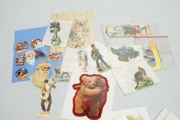 Assorted box of scraps and ephemera including postcards, and early photographs of children with