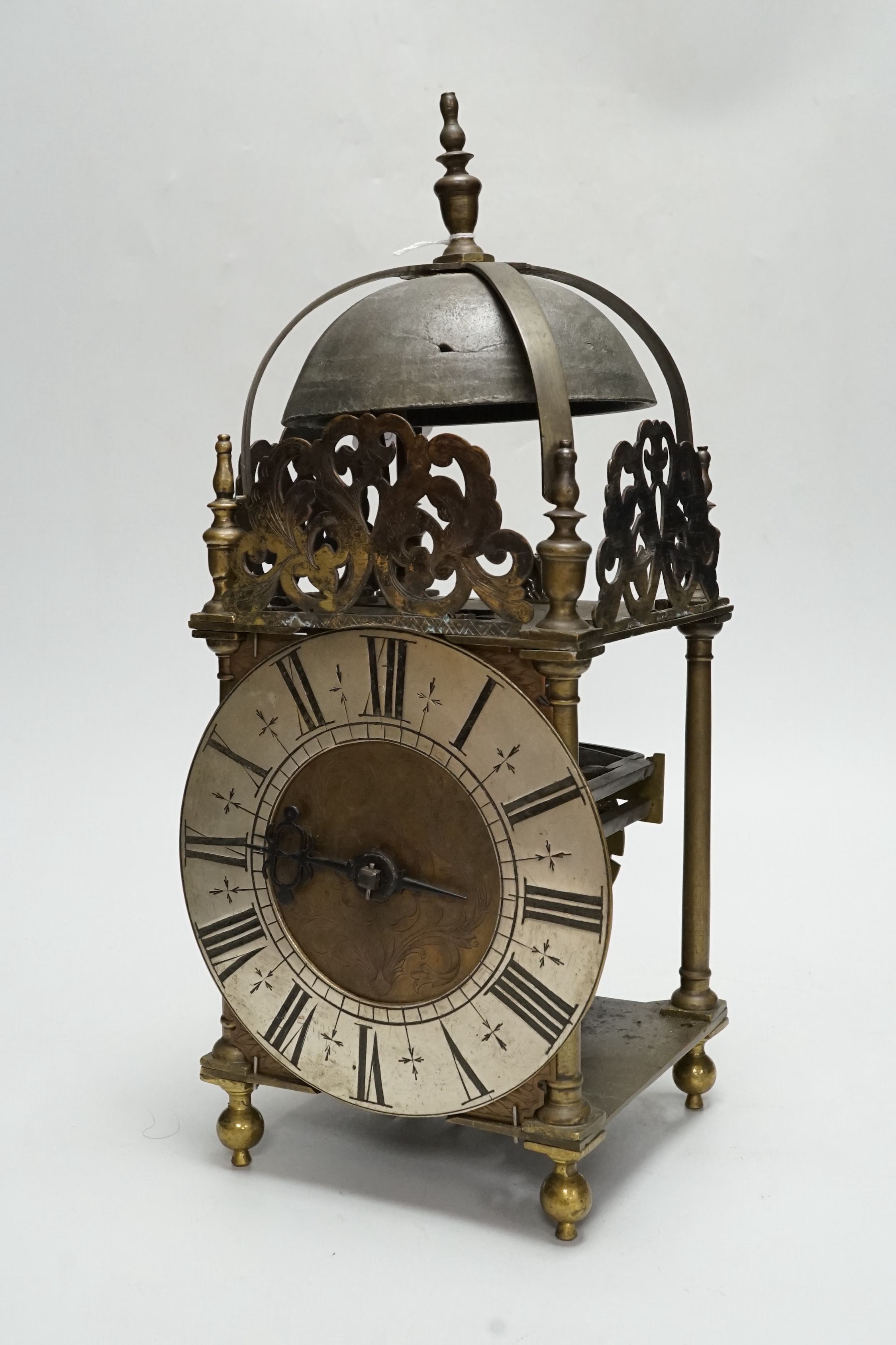 An 18th century and later brass lantern clock, 38cm
