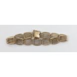 An early 20th century 9ct gold gate link bracelet, 17cm, 12.9 grams.