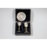 A cased matched Victorian silver travelling communion set, London, 1846, London, 1890 and