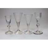 Four various George II wine/cordial glasses, three with folded feet, tallest 14cm