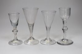Four various George II wine/cordial glasses, three with folded feet, tallest 14cm