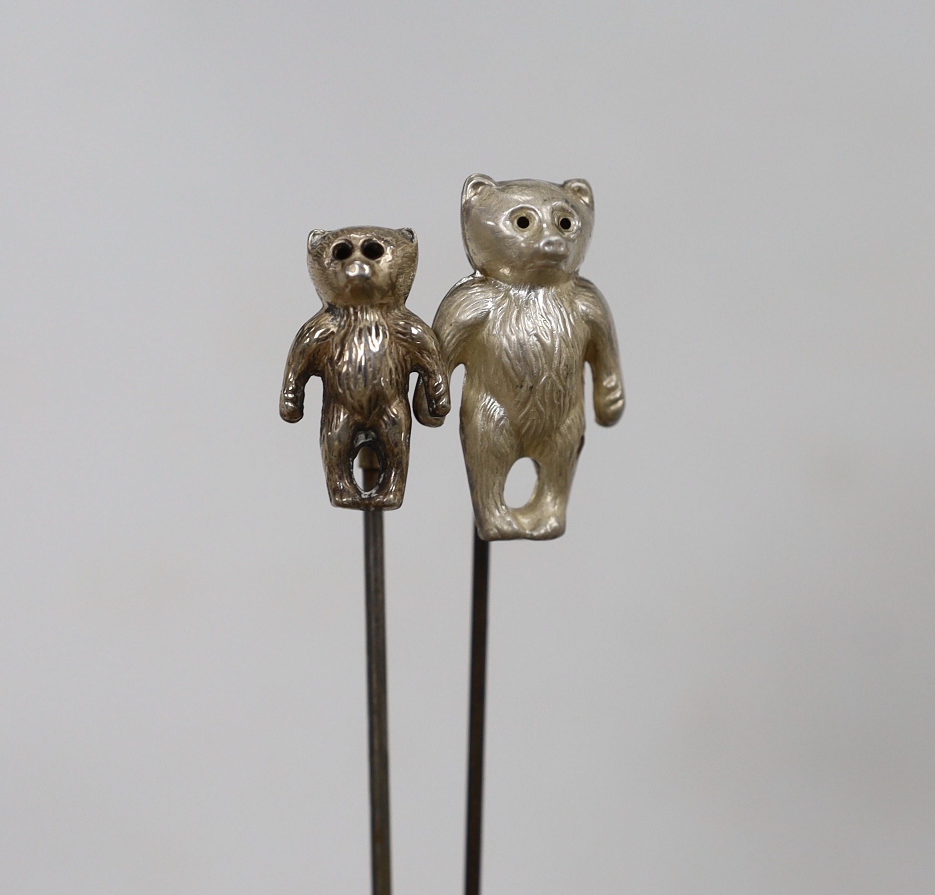 Two Edwardian hat pins with silver hallmarked teddy bea tops, and a silver 1960's teddy bear rattle - Image 6 of 9