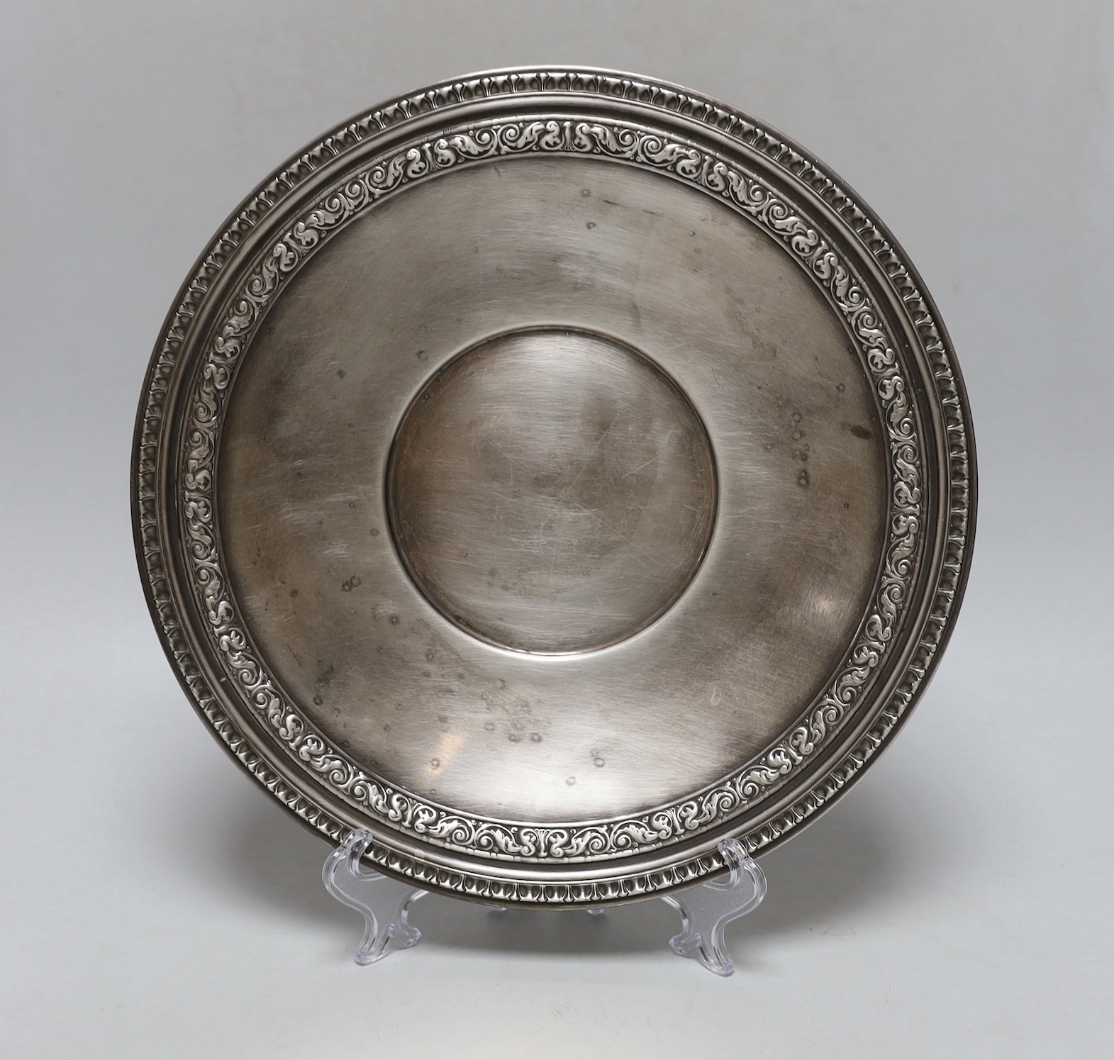 A silvered plate by Reed & Barton, 27cm diameter