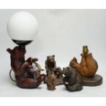 A group of resin bears, one a table lamp, another lamp (wiring missing) and an advertising Polar