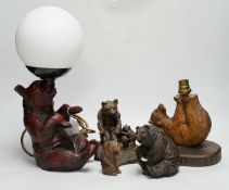 A group of resin bears, one a table lamp, another lamp (wiring missing) and an advertising Polar