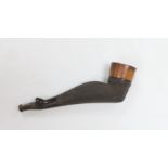 A novelty 'ladies stocking legged’ pipe, 9.5cm long