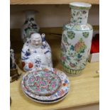 Two Chinese vases, three plates and a figure of Budai, tallest vase 44cm