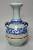 A Chinese celadon and underglaze blue two handled vase, 33cm tall