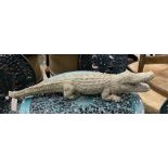 A reconstituted stone alligator garden ornament, length 82cm