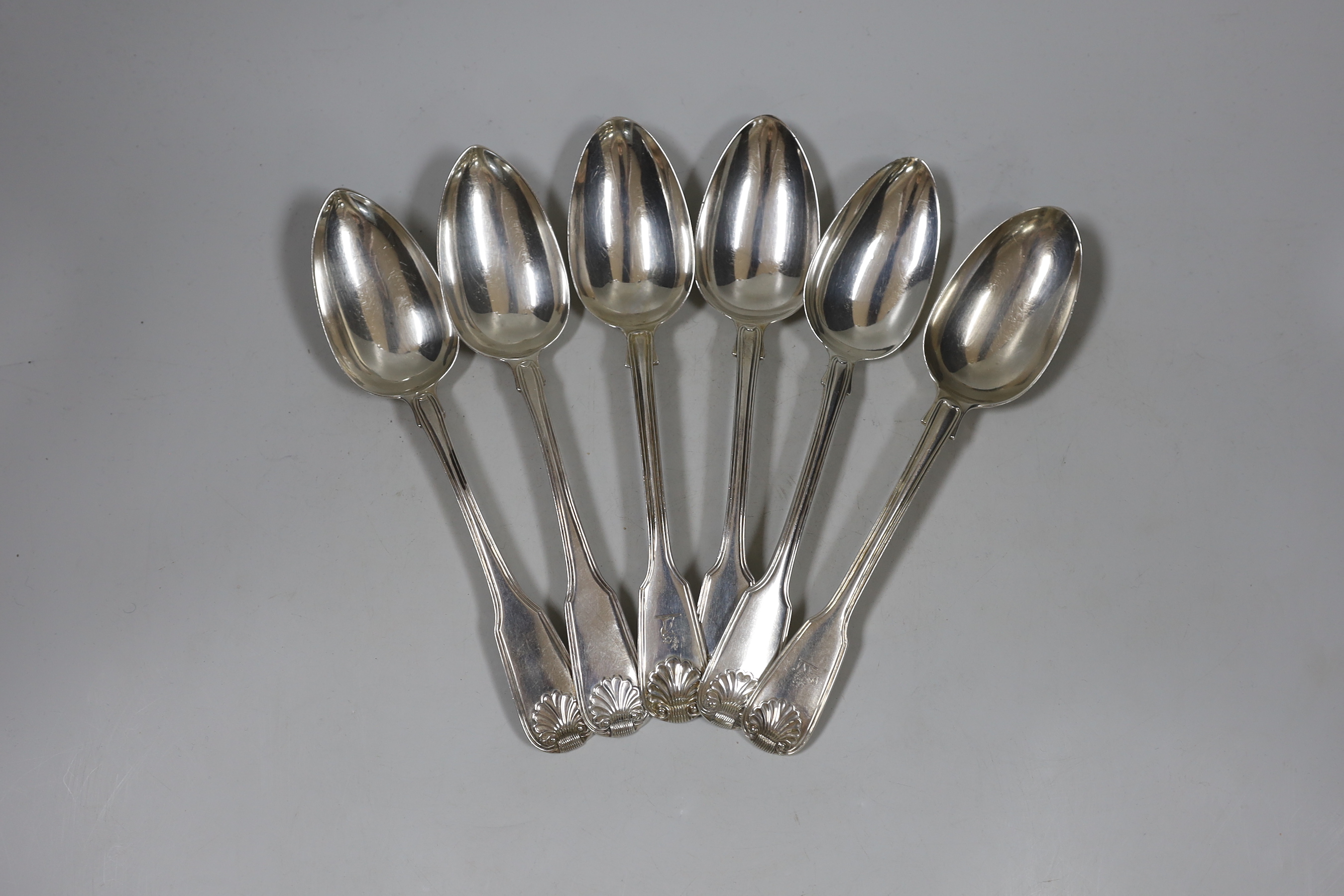 A harlequin set of six early to mid 19th century silver fiddle, thread and shell pattern table