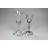 A George II wine glass, domed foot and a George II wine glass, folded foot, largest 16.5cm high