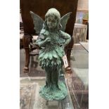 A patinated cast metal angel garden ornament, height 55cm