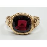 An early 20th century Austro-Hungarian? yellow metal and garnet set ring, size P/Q, gross weight 3.9