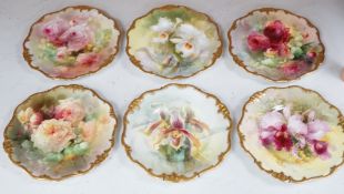 Six Royal Doulton floral painted plates, three signed E. Raby and three signed D. Dewberry