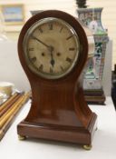 An Edwardian mahogany tear-drop mantel clock (K&P), 42cm