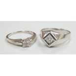 A 585 white metal and solitaire diamond ring, size U/V, gross weight 3.5 grams and a modern 18ct