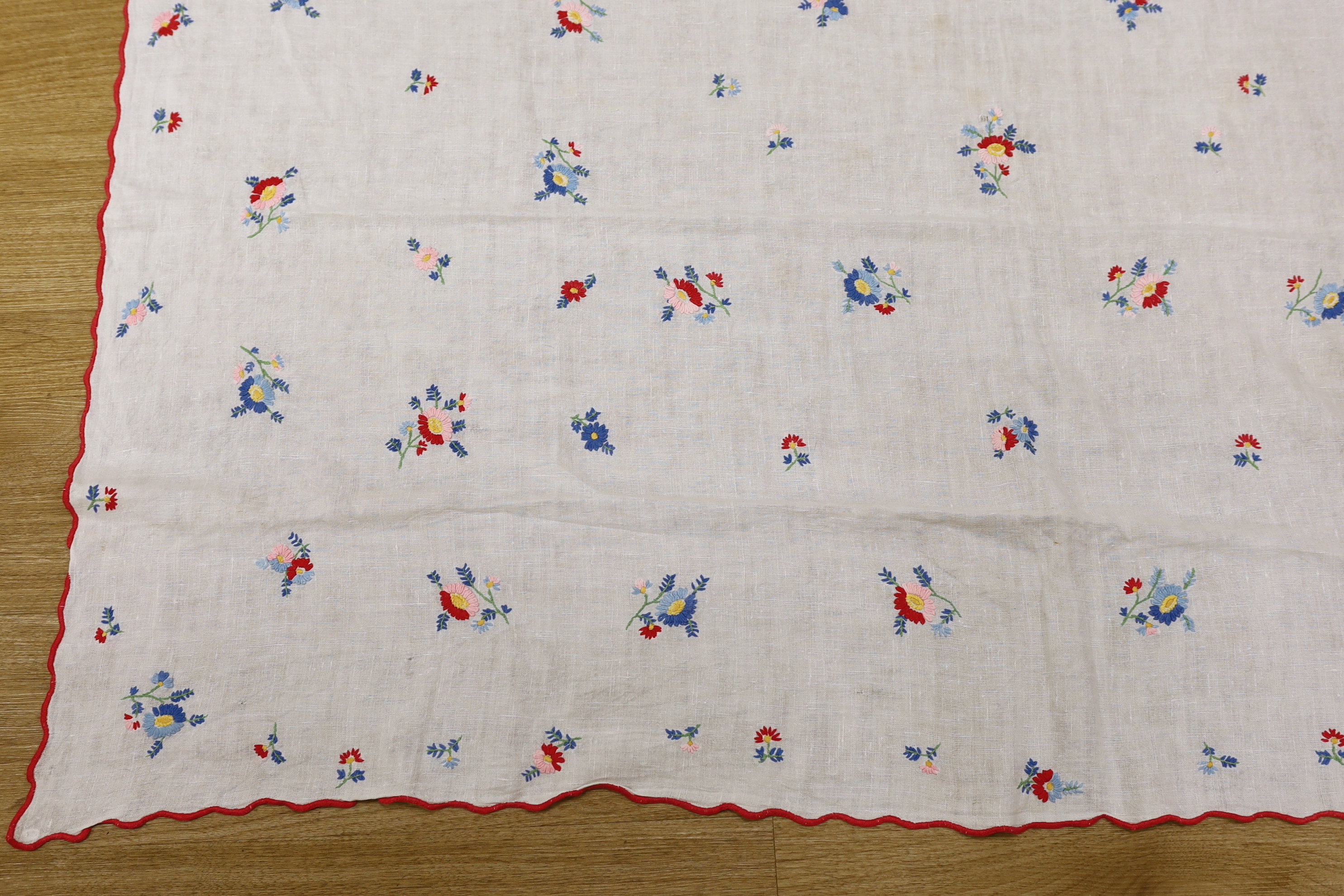 A 20th century woven linen panel, hand embroidered with scattered floral polychrome sprigs and a - Image 4 of 5