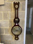 An early 19th century mahogany wheel barometer, height 110cm