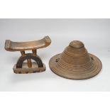 An Ashanti wood headrest and a small African wood shield