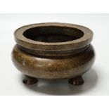 A Chinese bronze censer, ding, 14cm diameter