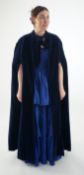 A lady's midnight blue long evening cape. Maindel label