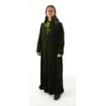 A gentleman's Regency style overcoat - bottle green with brown trim and fur (fake) collar. Ex Carl