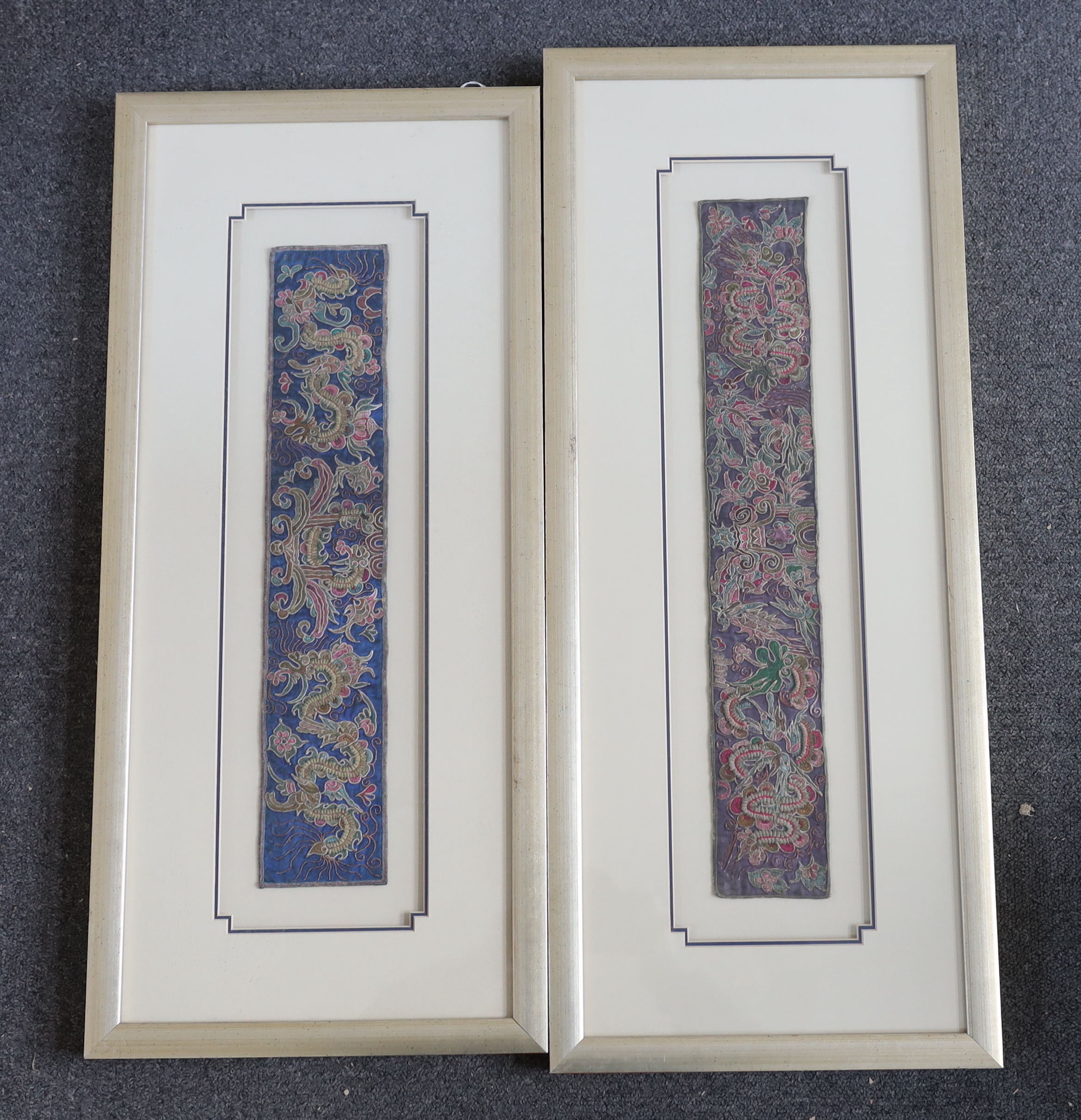 Two 19th century Chinese sleeve bands, embroidered in rich polychromes silks, designed with