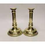 A pair of Victorian brass candlesticks possibly from House of Commons or military consecutively