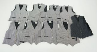 Nine men's black and white striped waistcoats (various sizes) some marked Pavilion Opera 'The Barber