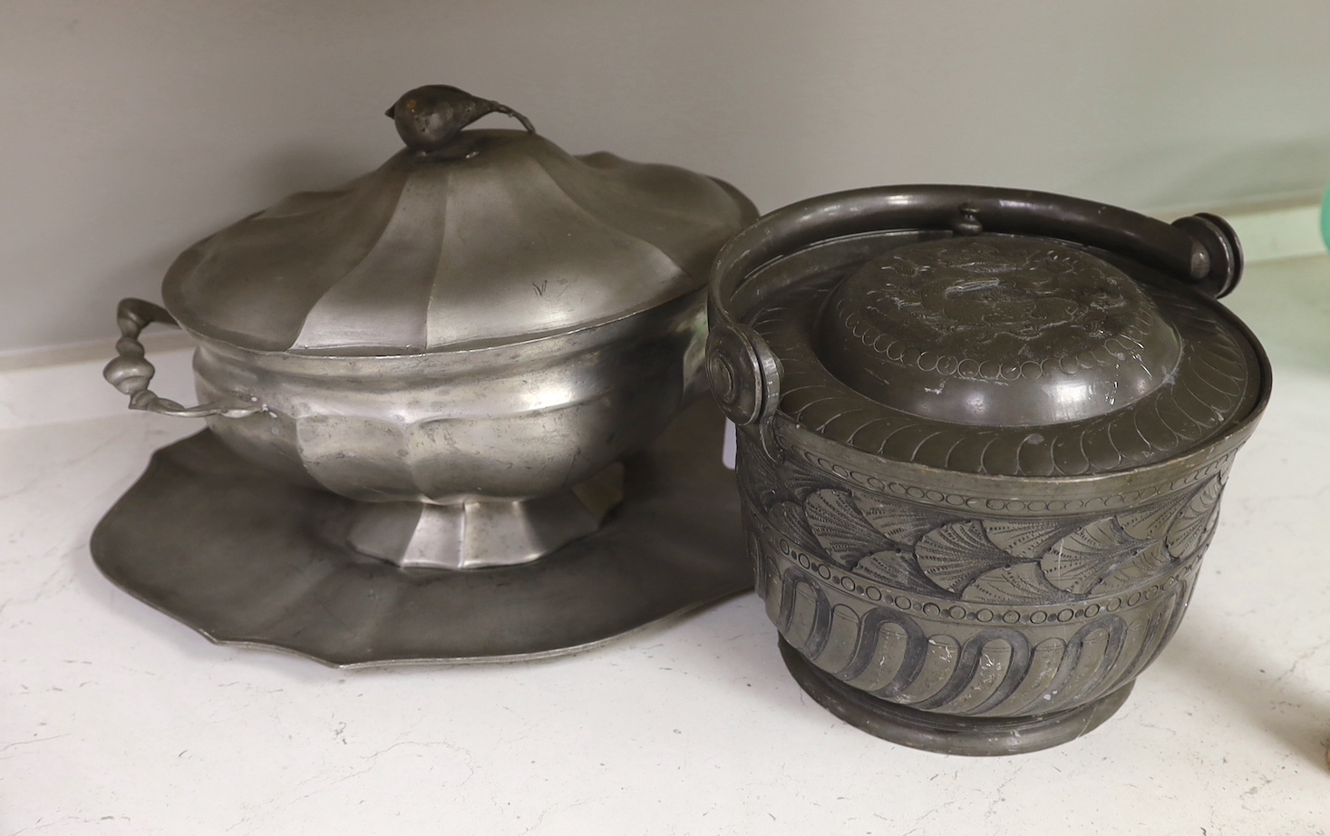 A Belgian? pewter ice bucket and a Kayserzinn tureen, cover and stand