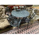 A painted aluminium circular garden table, diameter 92cm, height 72cm and four chairs