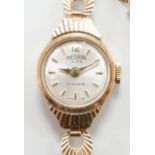 A lay's 9ct gold Medana manual wind wrist watch, on a 9ct gold bracelet, gross weight 12.2 grams.